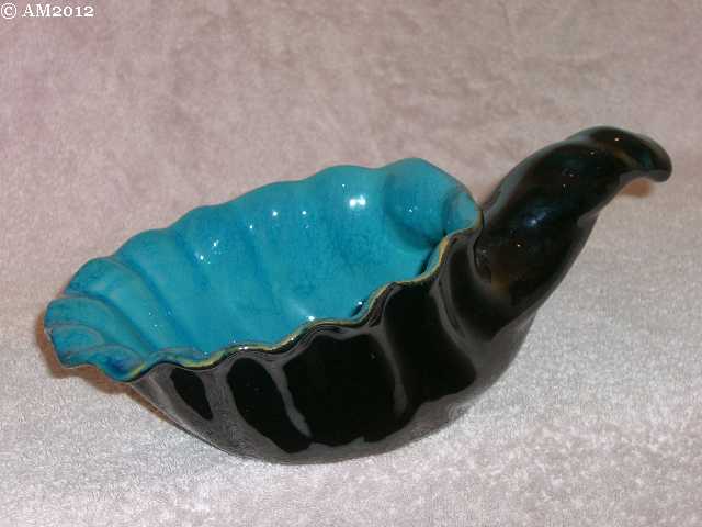 Medium cornucopia glazed back with turquoise interior